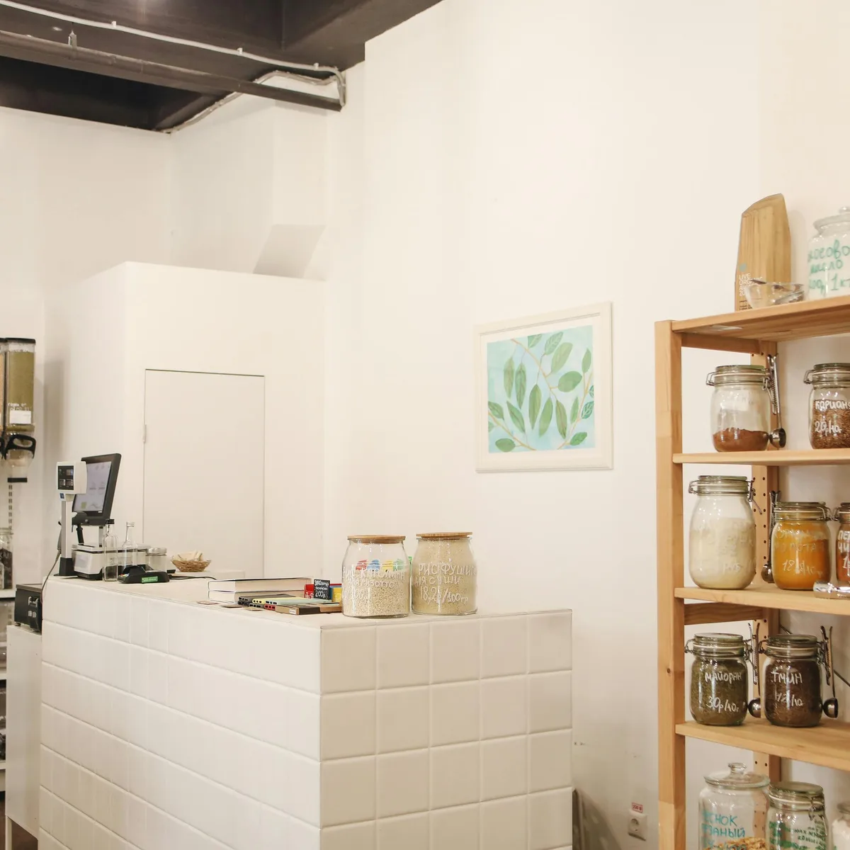Children planting seedlings in raised beds at Verdant Market community garden